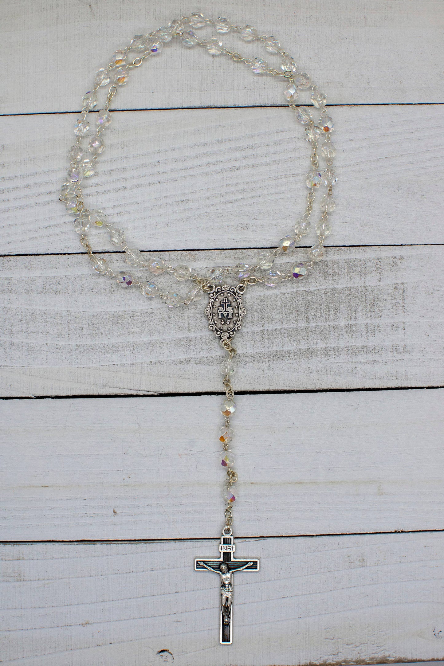 Crystal Clear Rosary Beads with Madonna Centerpiece