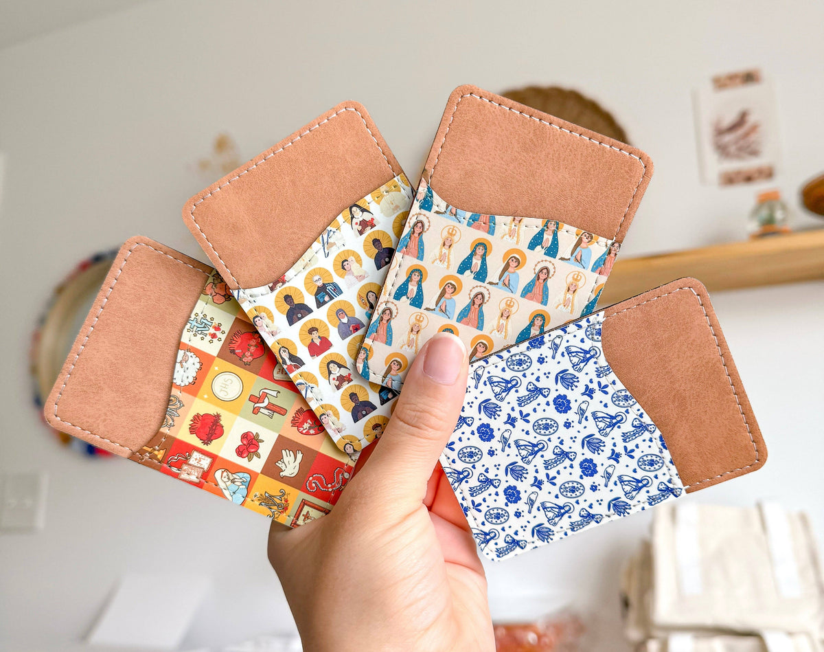 Religious Phone Wallets (Blessed Mother, Catholic Saints, Marian Royal Blue, St. Therese, The Lord is With You